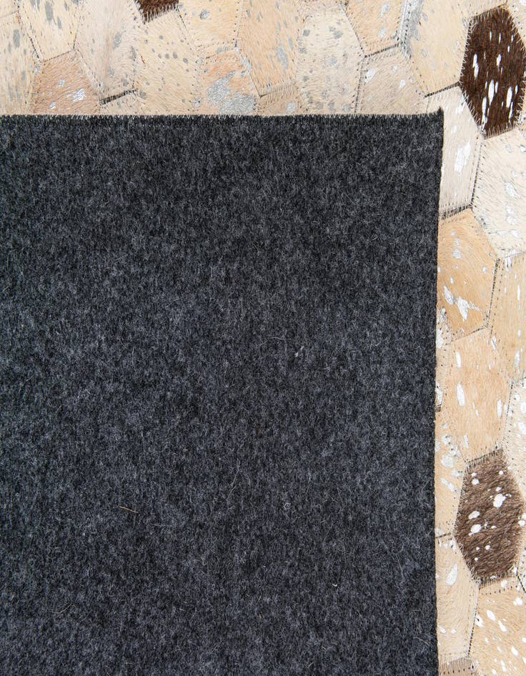 Detail image of  5' 3 x 7' 4 Cowhide Stocks Rug
