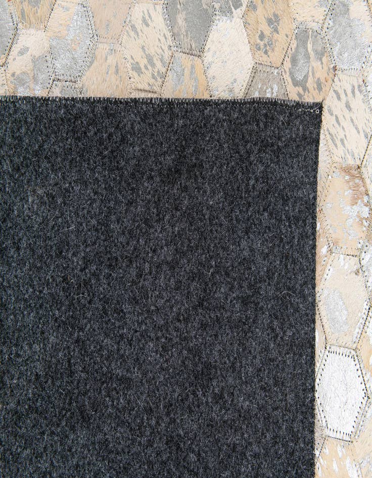 Detail image of  5' 3 x 7' 8 Cowhide Stocks Rug