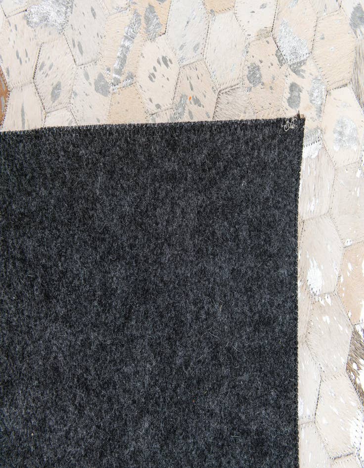 Detail image of  5' x 7' 11 Cowhide Stocks Rug