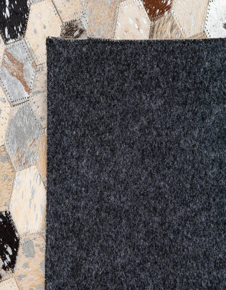 Detail image of  5' 4 x 7' 6 Cowhide Stocks Rug