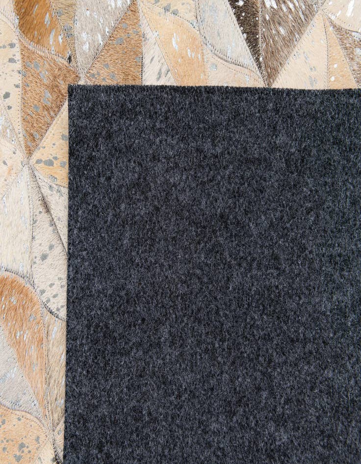 Detail image of  5' 3 x 7' 7 Cowhide Stocks Rug