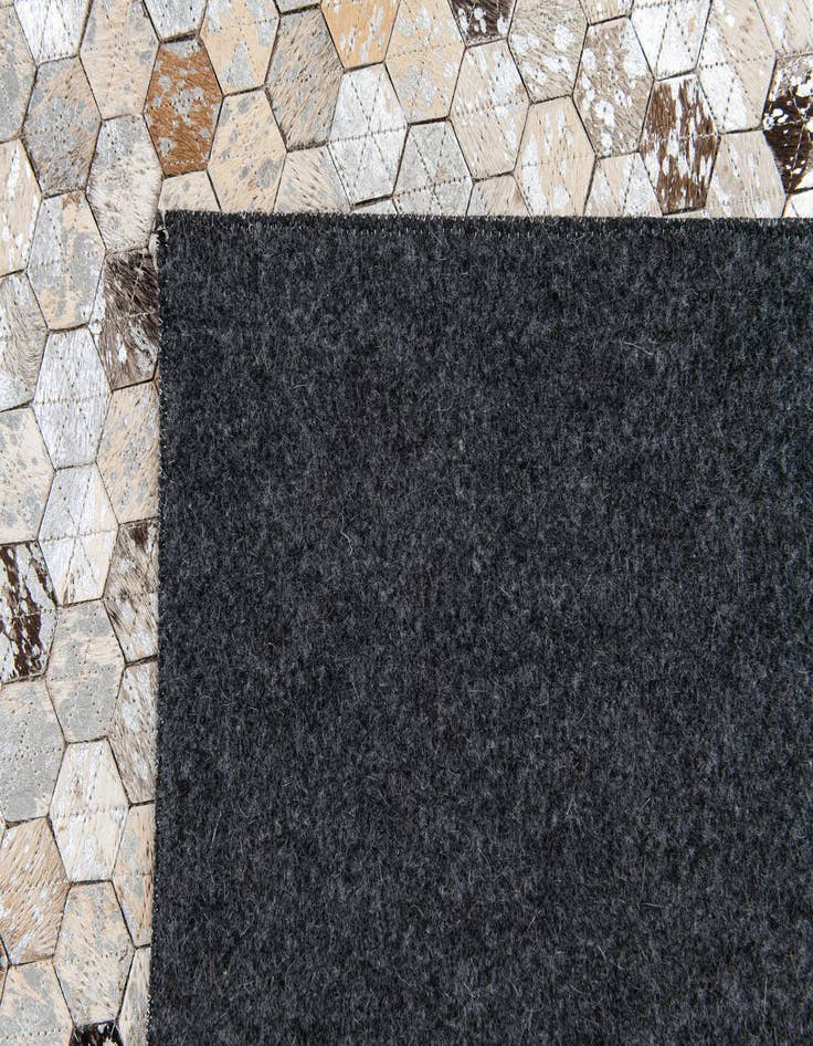 Detail image of  5' 3 x 7' 9 Cowhide Stocks Rug