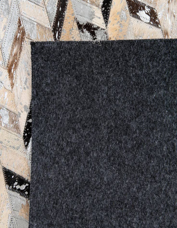 Detail image of  5' 4 x 7' 6 Cowhide Stocks Rug