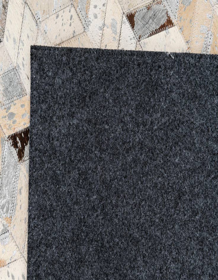 Detail image of  5' 4 x 7' 5 Cowhide Stocks Rug