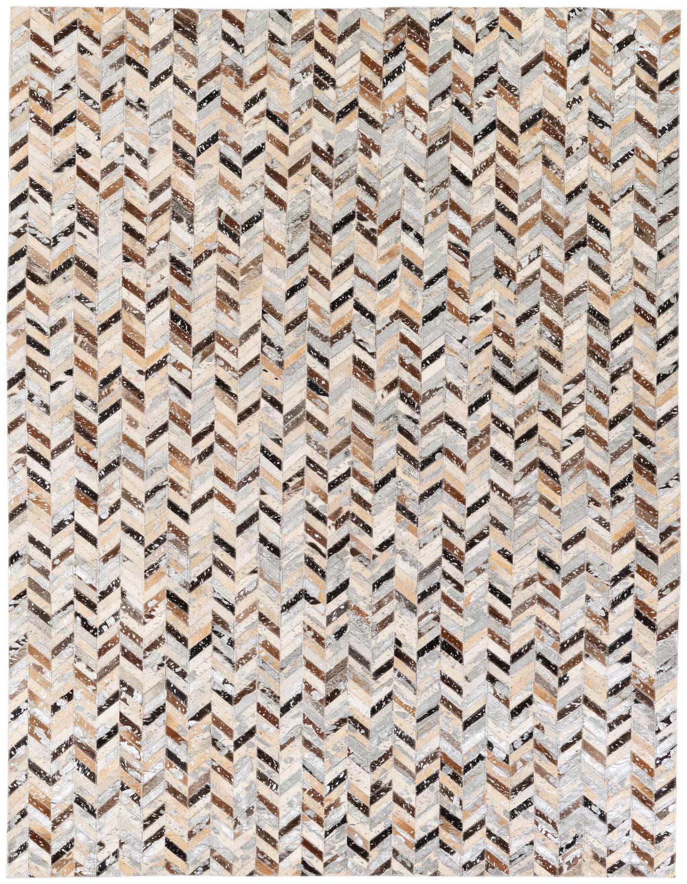 A 5x8 rectangular Cowhide Stocks rug by Rugs.com, featuring a modern multi-colored chevron pattern of natural cowhide patches.