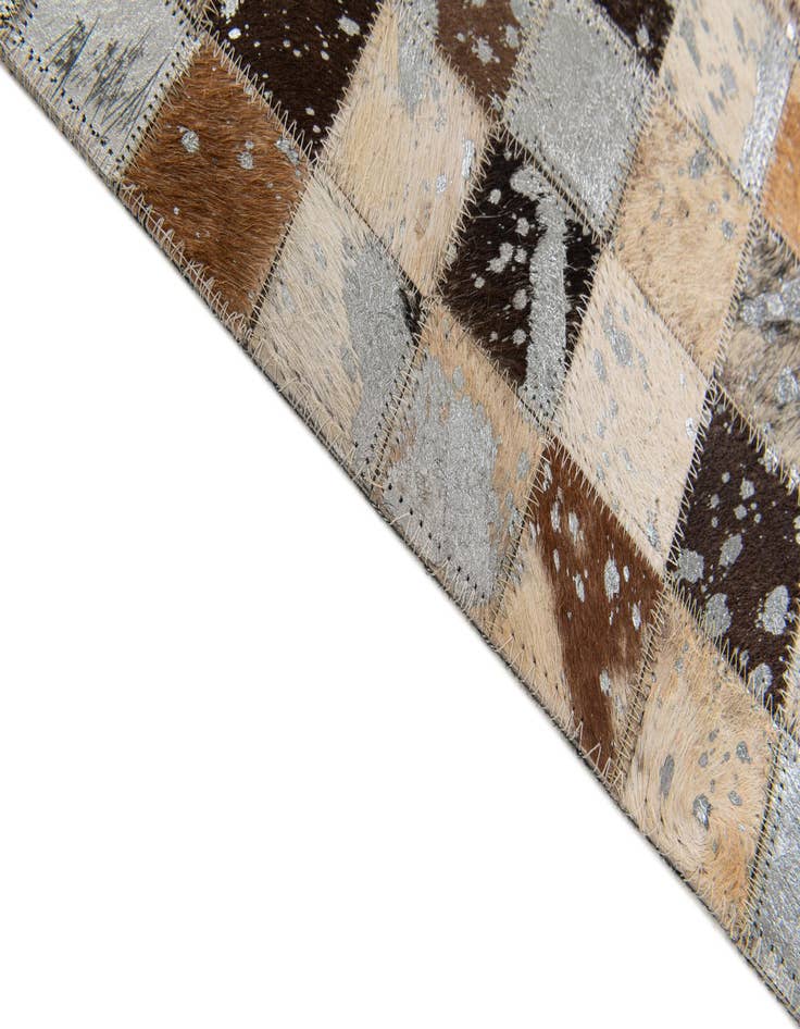 Detail image of  5' 3 x 7' 3 Cowhide Stocks Rug