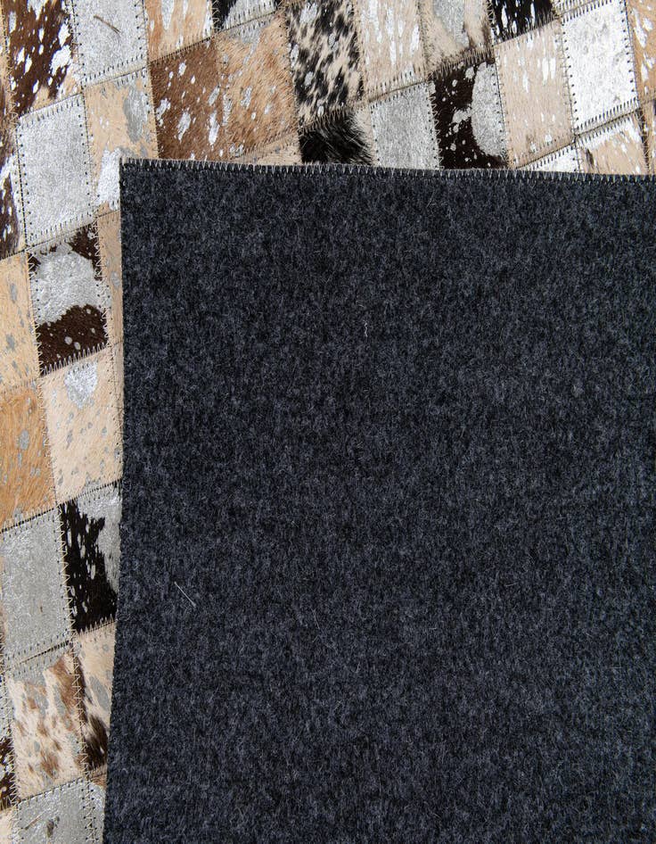 Detail image of  5' 3 x 7' 3 Cowhide Stocks Rug