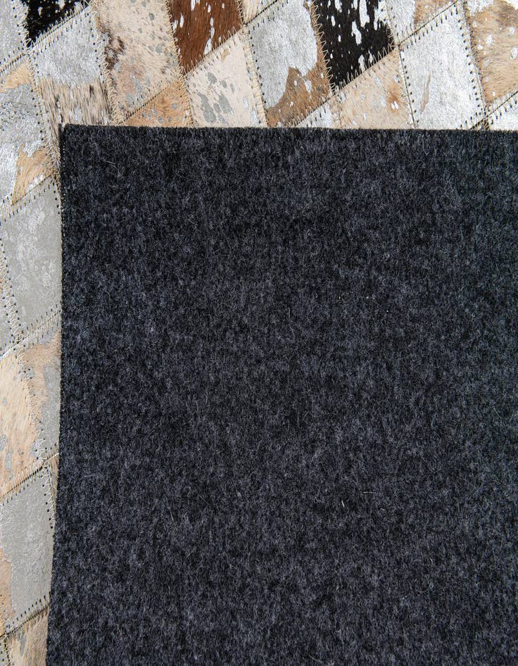 Detail image of  5' 2 x 7' 3 Cowhide Stocks Rug