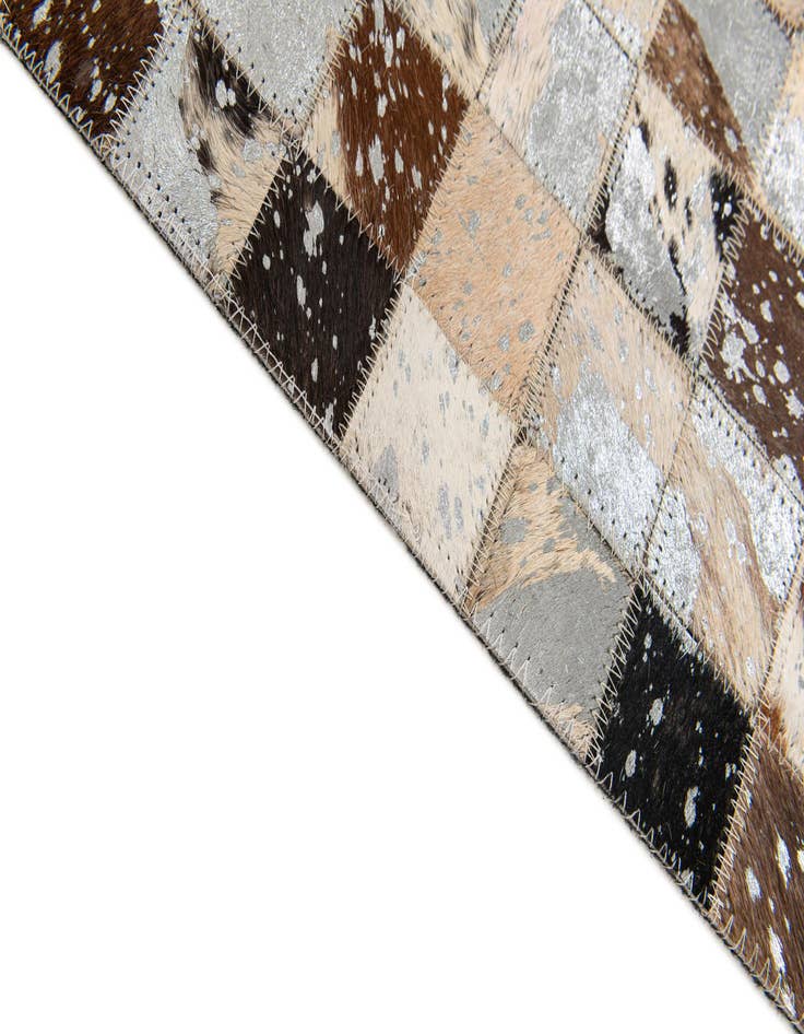 Detail image of  5' x 7' 3 Cowhide Stocks Rug