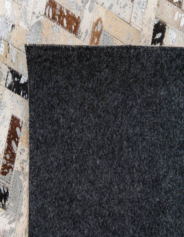 Detail image of  5' 4 x 7' 6 Cowhide Stocks Rug