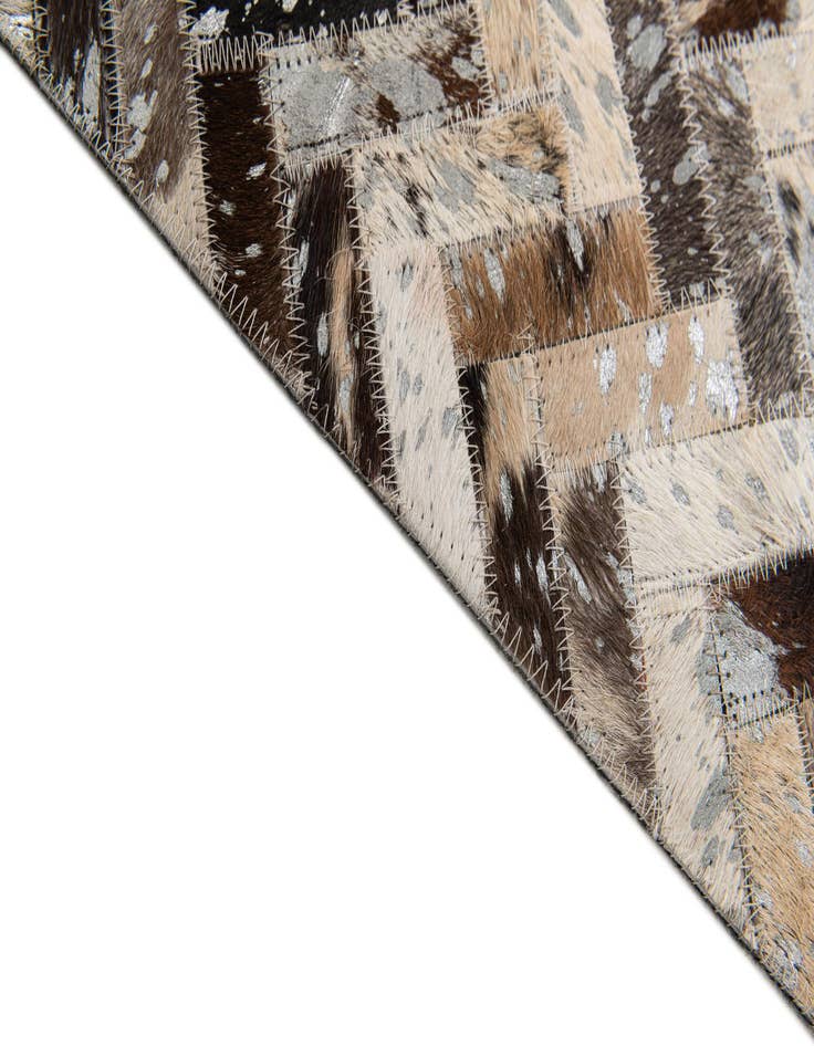 Detail image of  5' 3 x 7' 6 Cowhide Stocks Rug