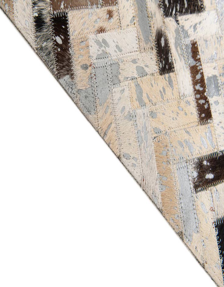 Detail image of  5' 3 x 7' 6 Cowhide Stocks Rug
