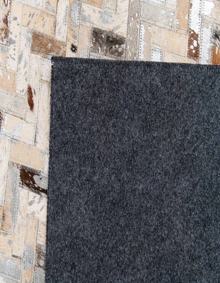 Detail image of  5' 3 x 7' 8 Cowhide Stocks Rug