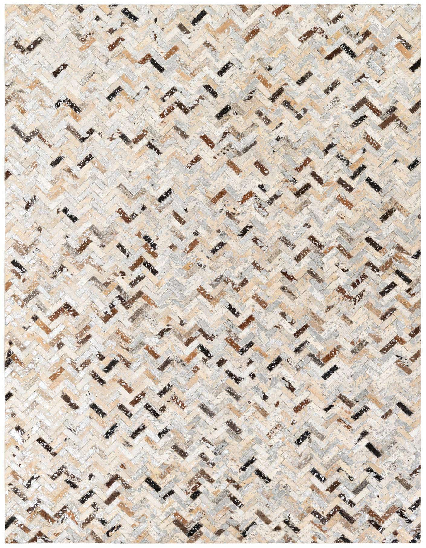 A rectangular 5x8 multi-colored cowhide rug with a modern chevron stripe pattern, ideal for a living room.