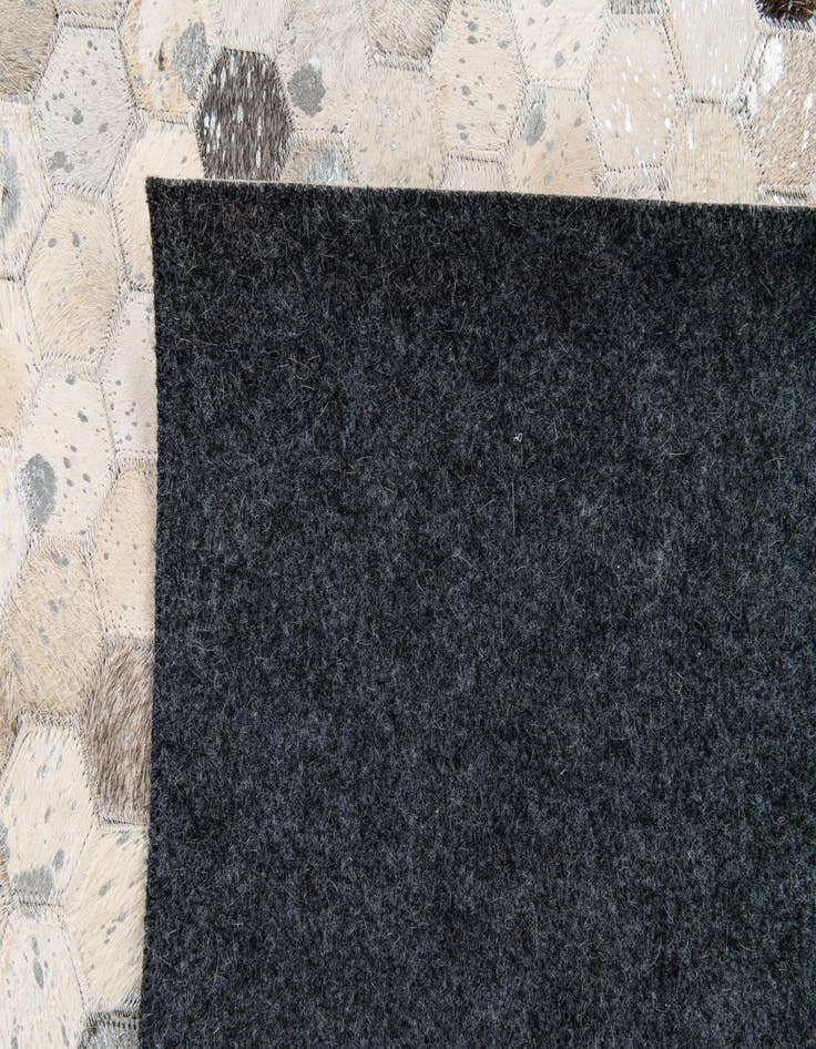 Detail image of  5' x 8' Cowhide Stocks Rug