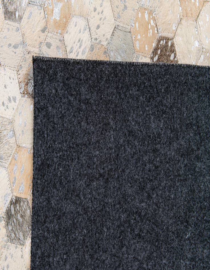 Detail image of  5' 3 x 7' 7 Cowhide Stocks Rug