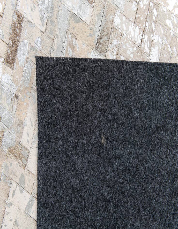 Detail image of  5' 4 x 7' 6 Cowhide Stocks Rug