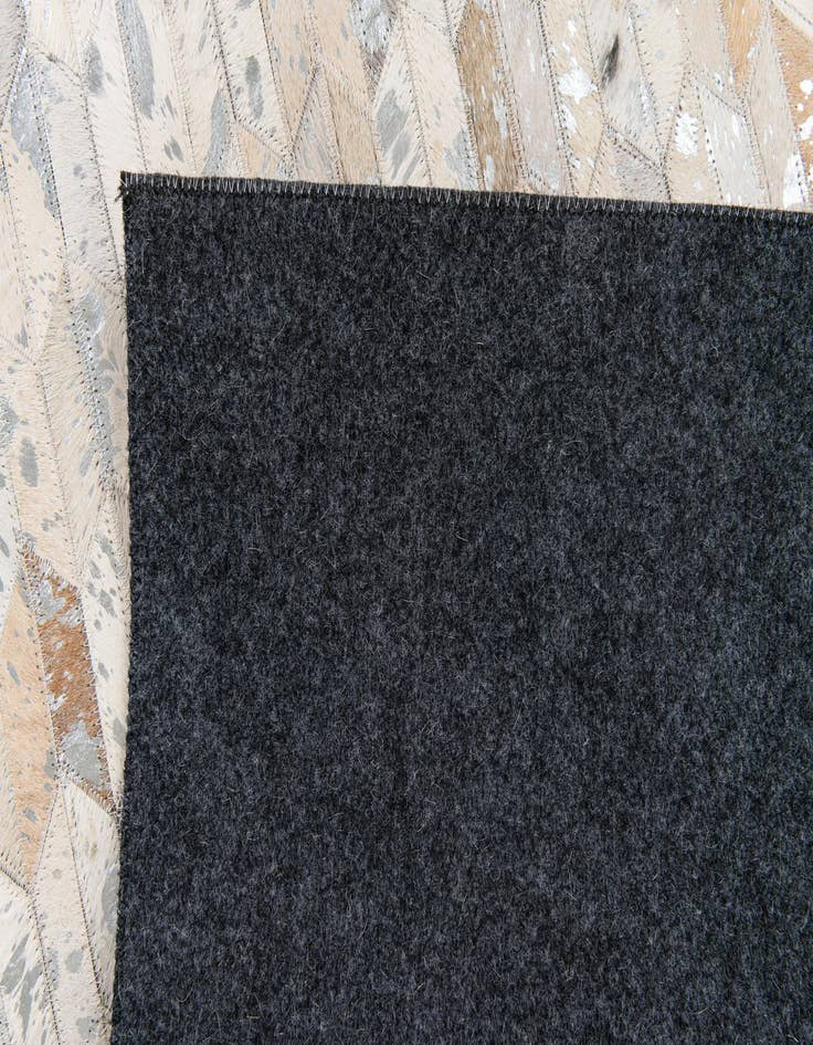 Detail image of  4' 11 x 8' Cowhide Stocks Rug