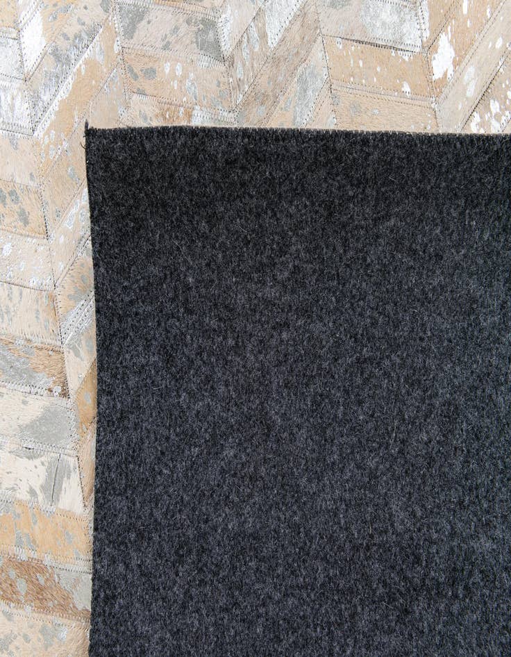 Detail image of  5' 6 x 7' 7 Cowhide Stocks Rug