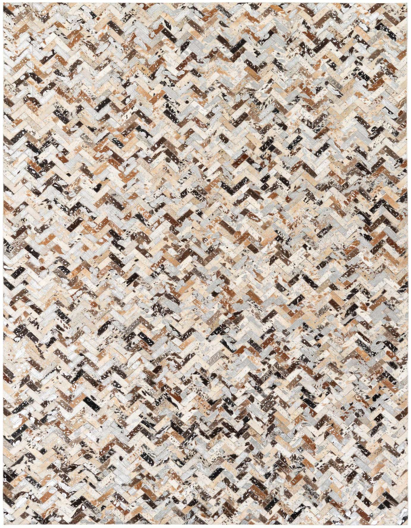 A rectangular 5x8 multi-colored cowhide rug featuring a modern chevron pattern in various shades of brown, beige, black, and gray.
