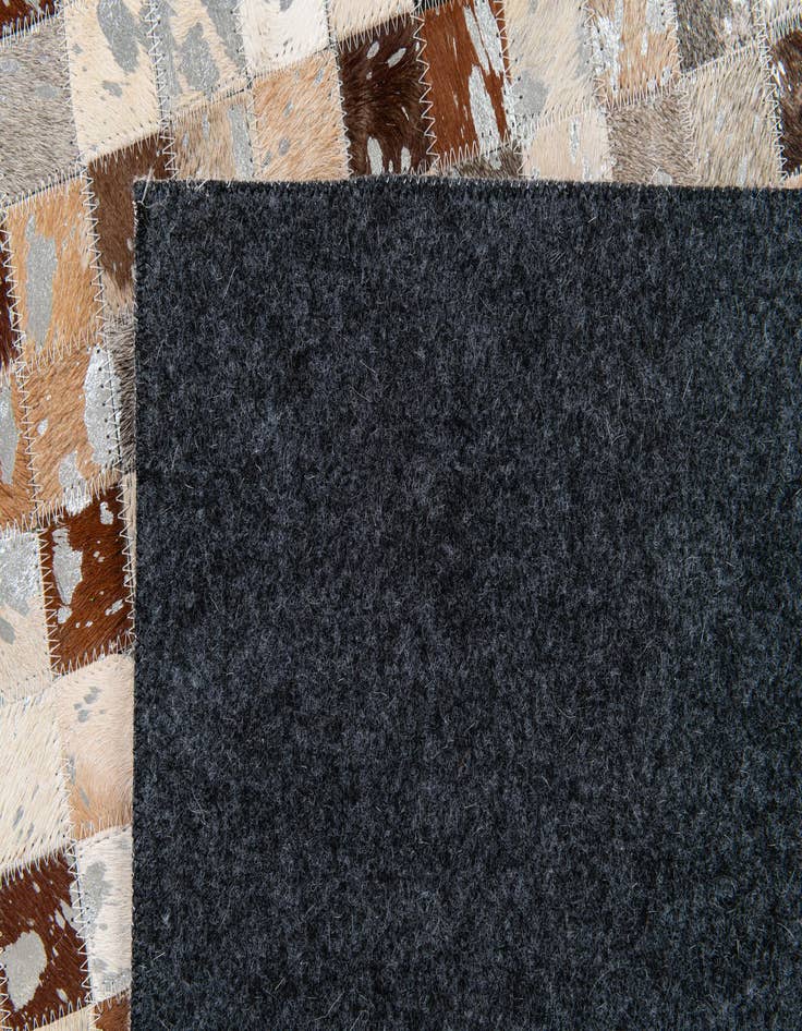 Detail image of  5' 1 x 8' Cowhide Stocks Rug