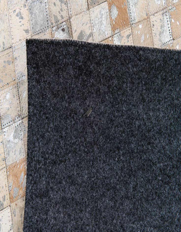 Detail image of  5' 4 x 7' 6 Cowhide Stocks Rug