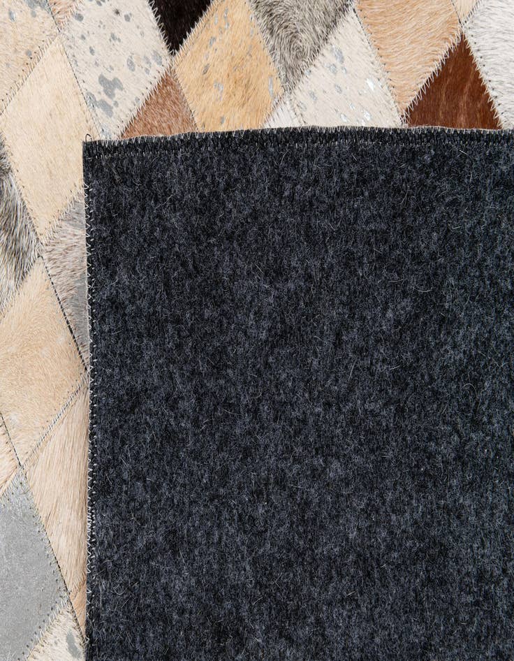 Detail image of  5' 2 x 8' 2 Cowhide Stocks Rug