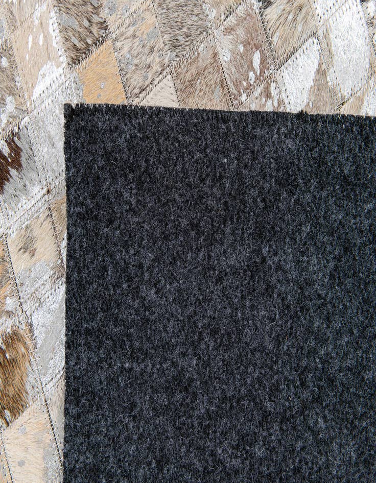 Detail image of  5' 4 x 7' 7 Cowhide Stocks Rug