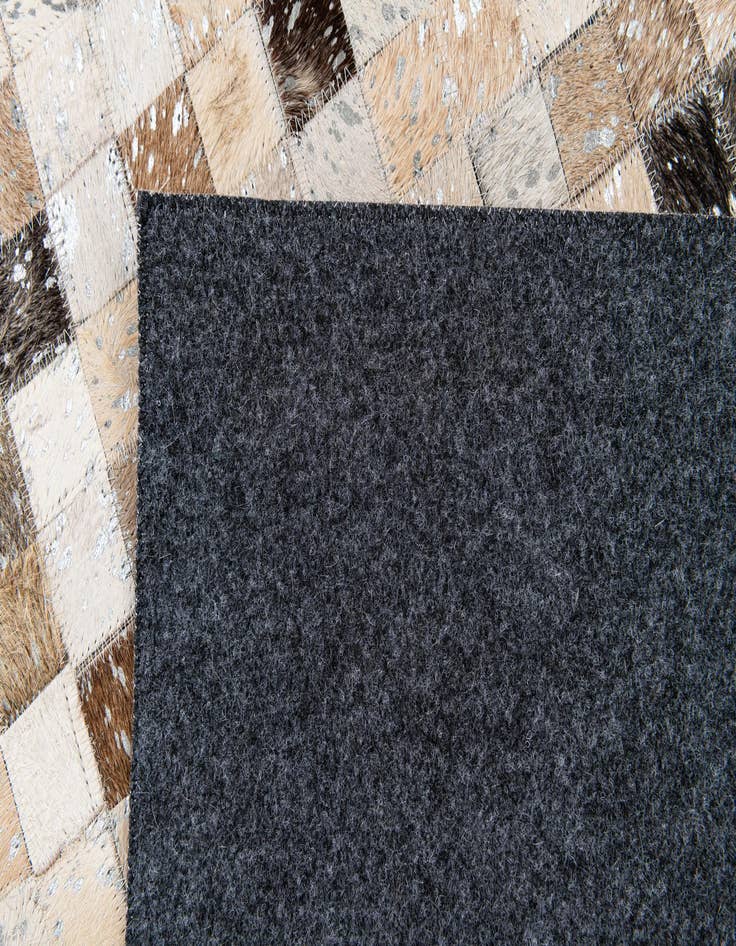 Detail image of  5' 4 x 7' 6 Cowhide Stocks Rug