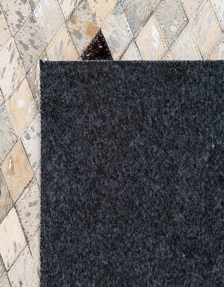 Detail image of  5' 3 x 7' 7 Cowhide Stocks Rug