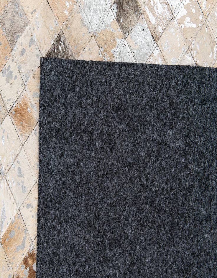 Detail image of  5' 3 x 7' 5 Cowhide Stocks Rug