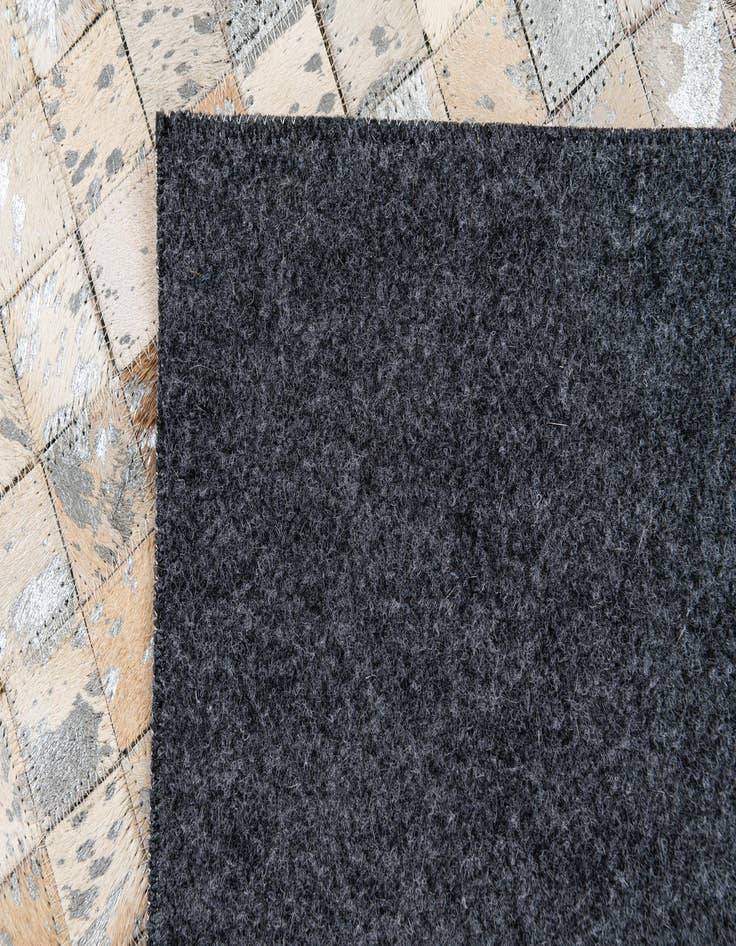 Detail image of  5' 2 x 7' 5 Cowhide Stocks Rug