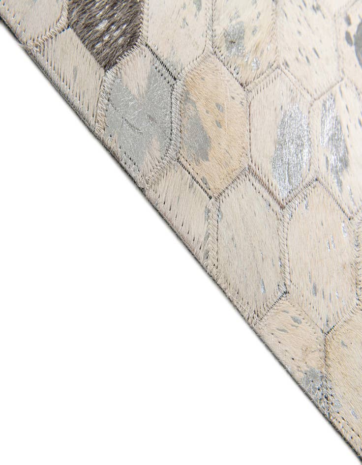 Detail image of  5' x 7' 11 Cowhide Stocks Rug