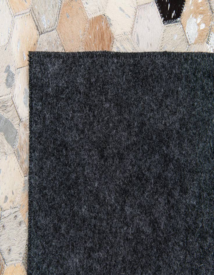 Detail image of  5' 1 x 7' 9 Cowhide Stocks Rug