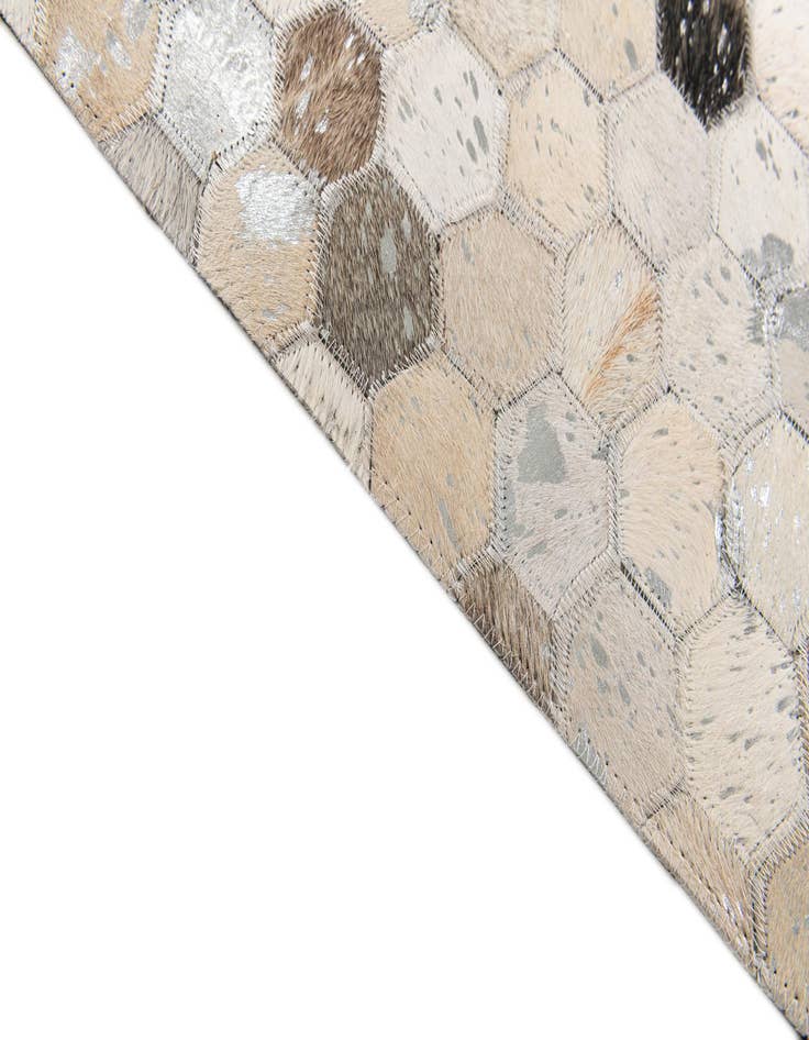 Detail image of  5' 1 x 8' Cowhide Stocks Rug