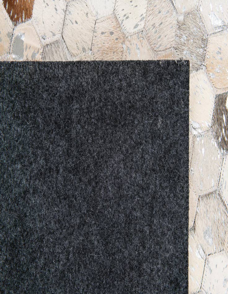 Detail image of  5' 1 x 8' Cowhide Stocks Rug