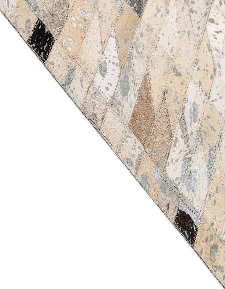 Detail image of  5' 3 x 7' 5 Cowhide Stocks Rug