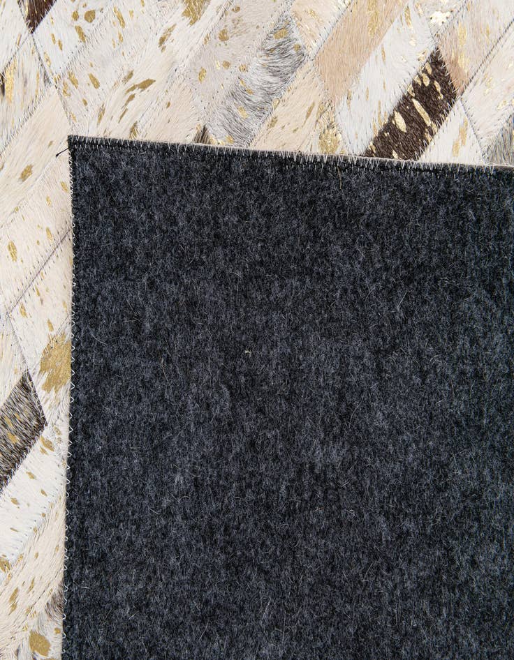 Detail image of  5' 2 x 7' 10 Cowhide Stocks Rug
