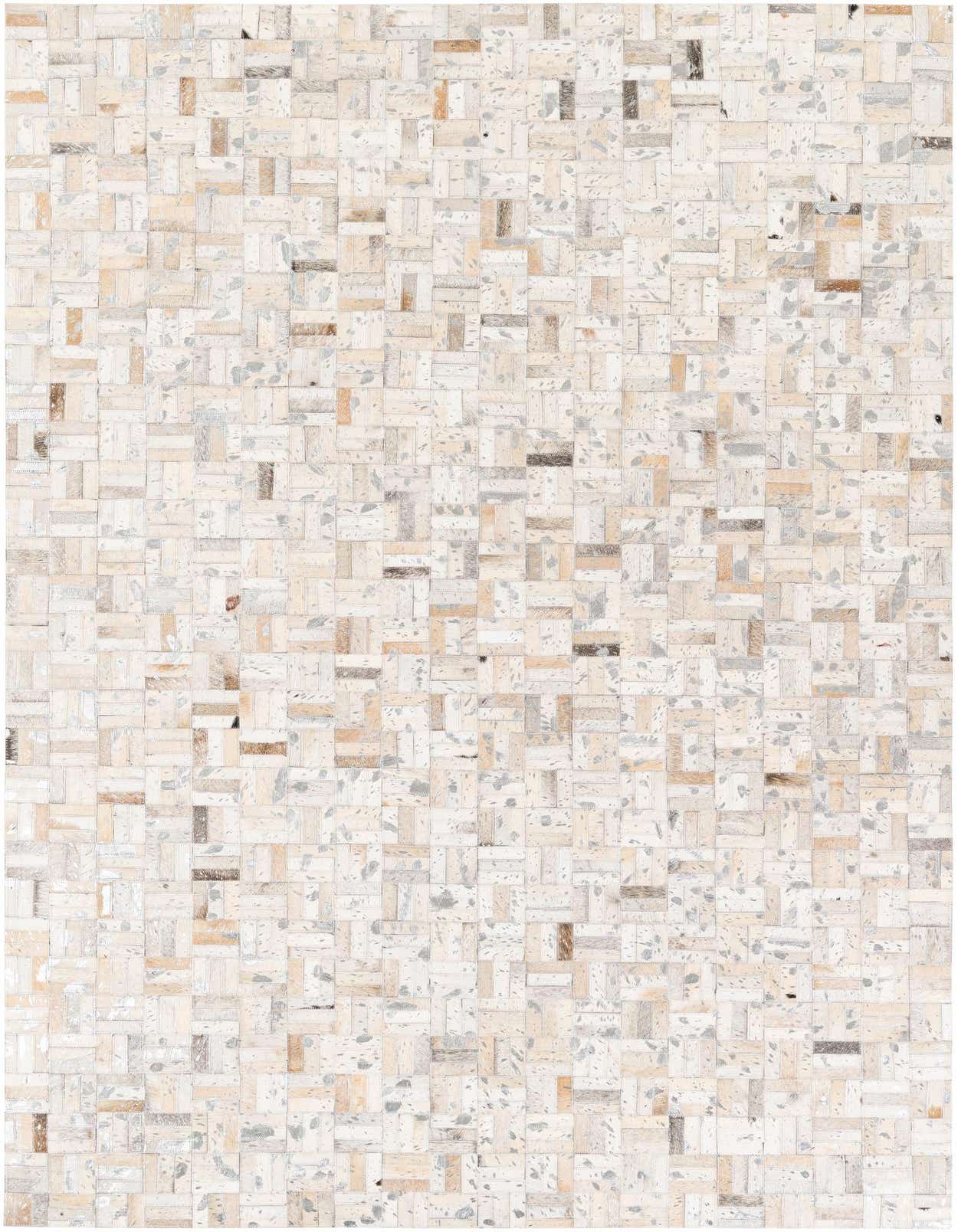 A 5x8 rectangular Cowhide Stocks rug by Rugs.com, featuring a modern patchwork of multi-colored cowhide and leather in a living room setting.