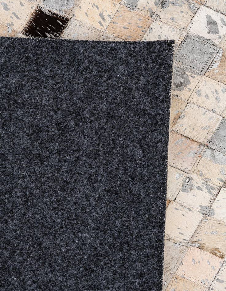 Detail image of  5' 5 x 7' 6 Cowhide Stocks Rug