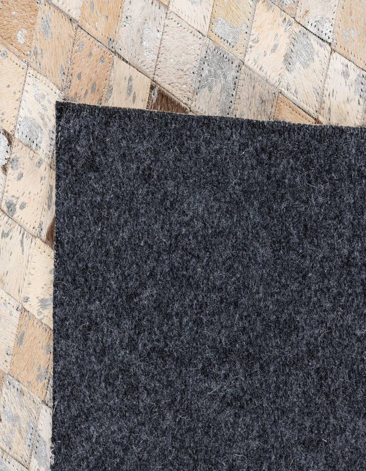 Detail image of  5' 3 x 7' 6 Cowhide Stocks Rug