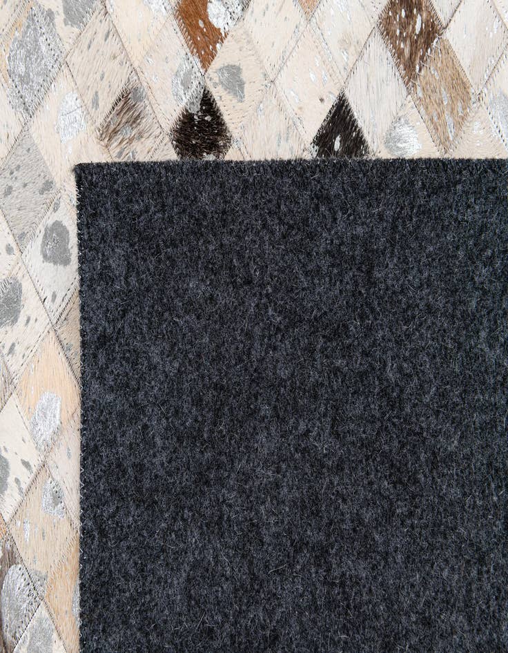 Detail image of  5' 1 x 7' 10 Cowhide Stocks Rug