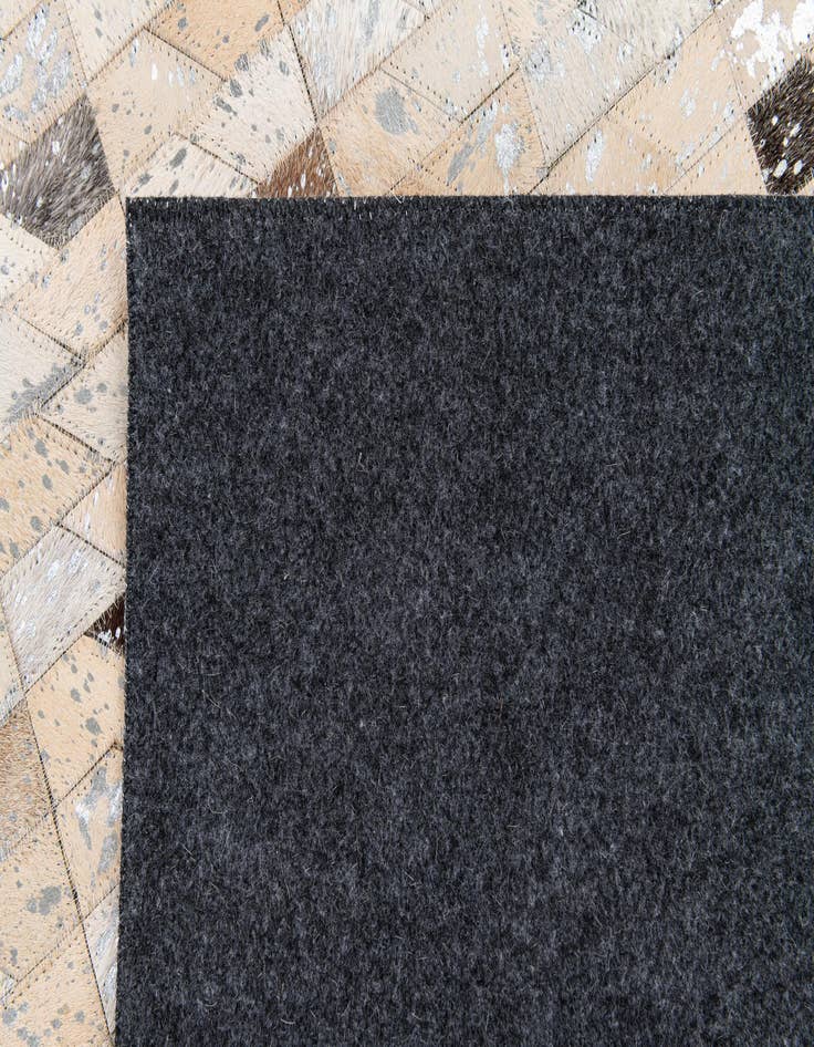 Detail image of  5' 4 x 7' 6 Cowhide Stocks Rug