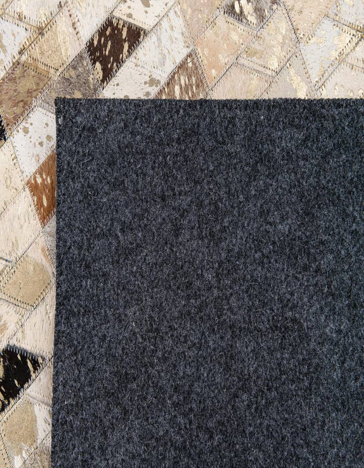 Detail image of  5' 6 x 7' 6 Cowhide Stocks Rug