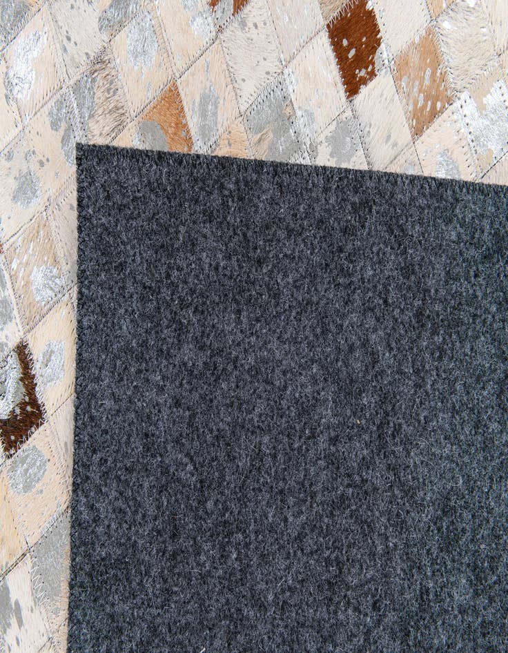 Detail image of  5' 1 x 7' 11 Cowhide Stocks Rug