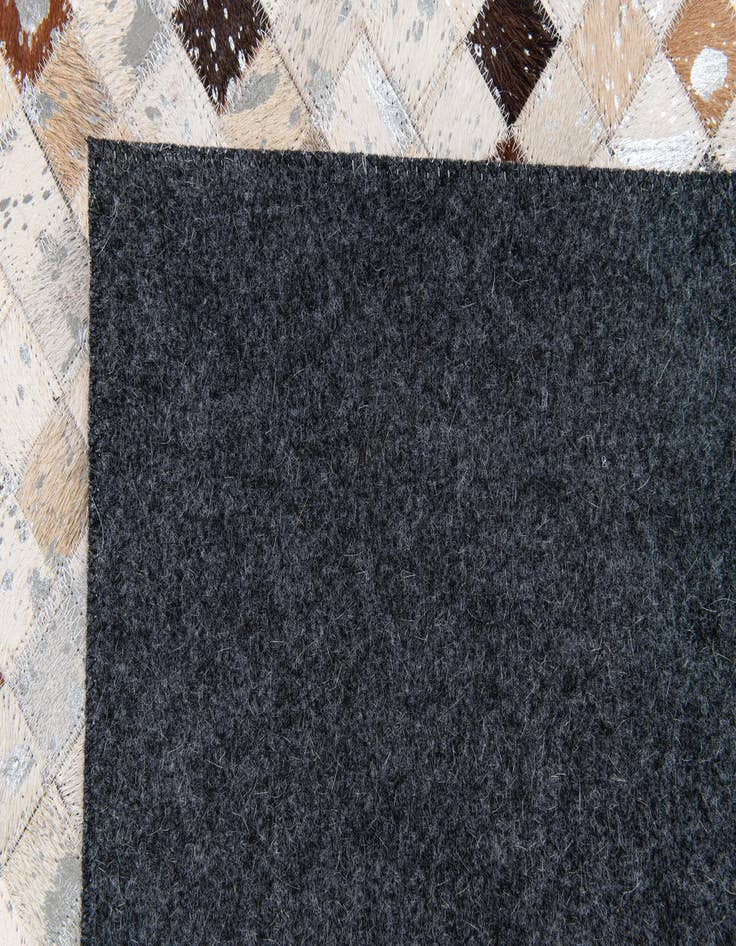 Detail image of  5' 1 x 8' Cowhide Stocks Rug