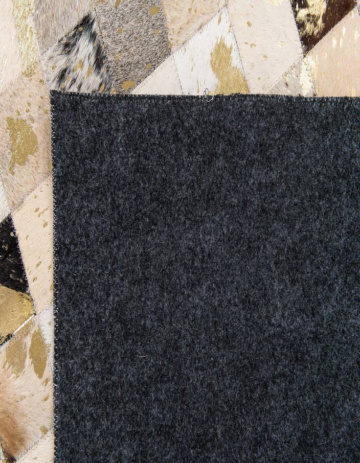 Detail image of  5' x 7' 11 Cowhide Stocks Rug