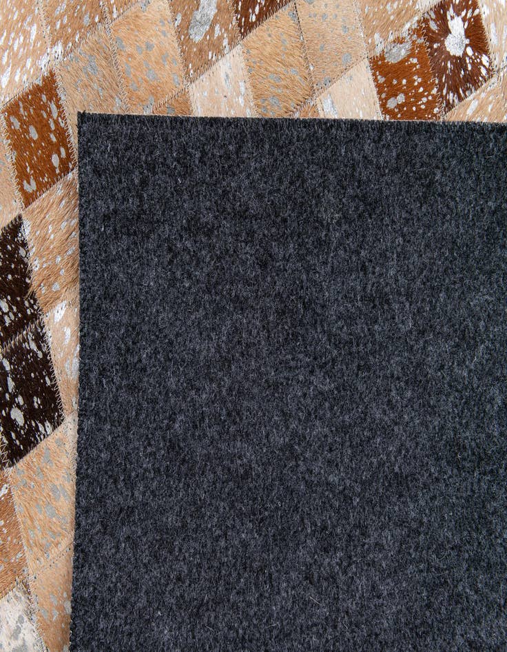 Detail image of  5' 2 x 7' 6 Cowhide Stocks Rug