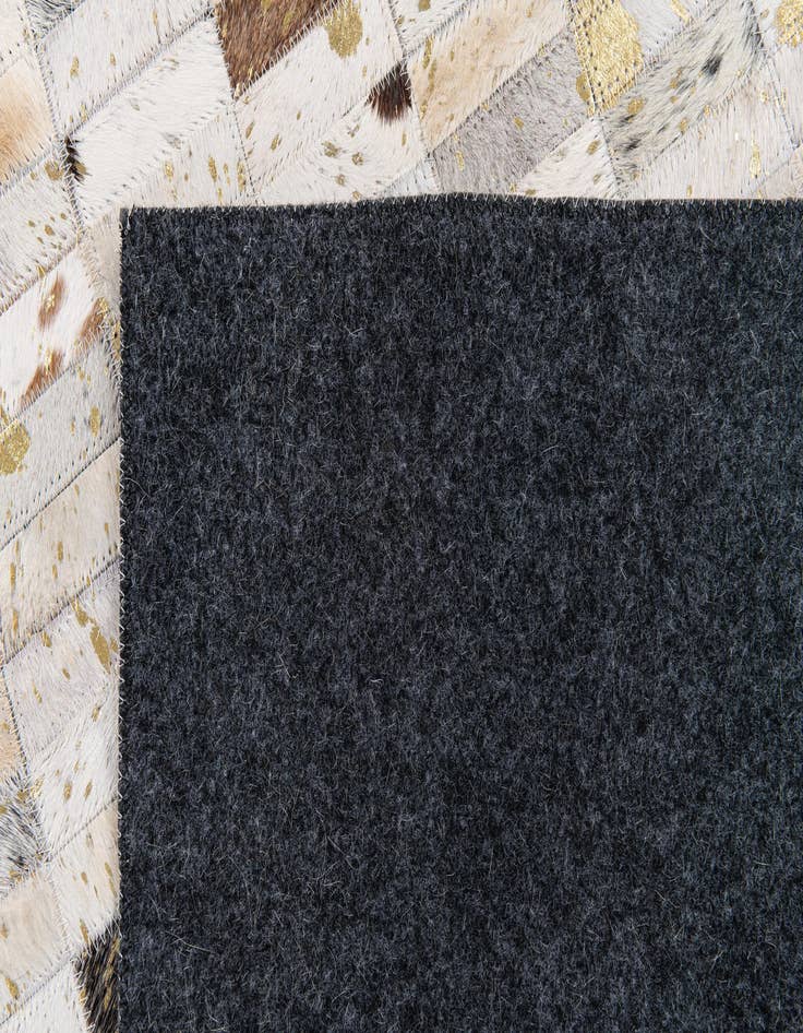 Detail image of  5' 2 x 7' 11 Cowhide Stocks Rug