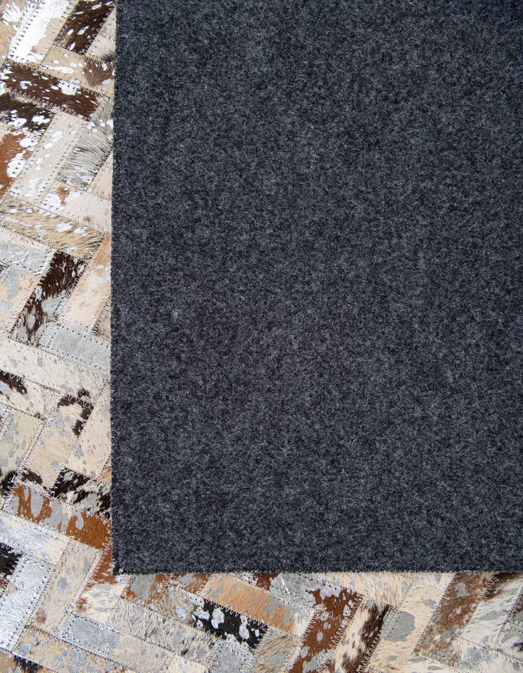 Detail image of  5' 2 x 7' 7 Cowhide Stocks Rug